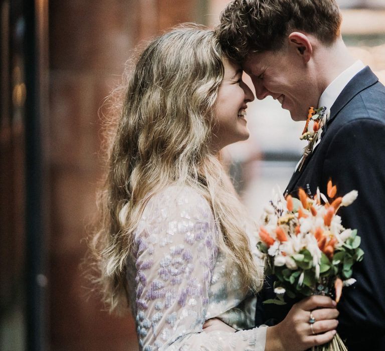 Bride and groom kissing on their wedding day | Micro wedding in Manchester 