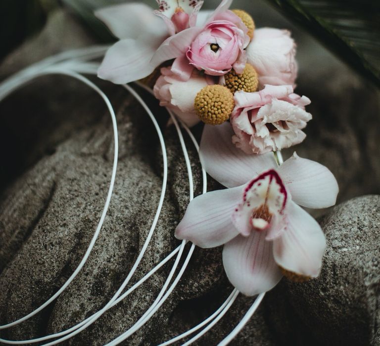 Pink peonies, orchids and craspedia balls for a vintage bridal flower hoop