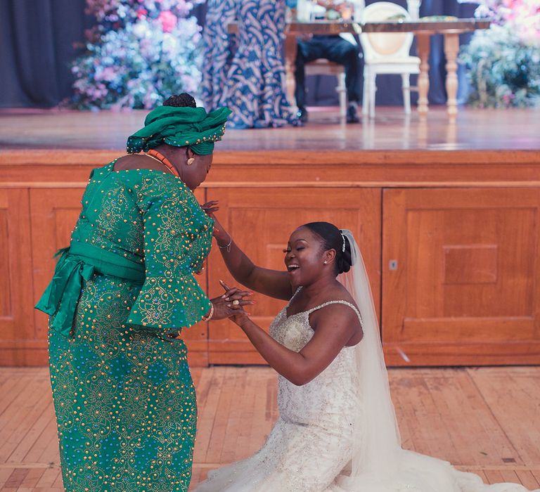 Bride dances on her wedding day with wedding guest