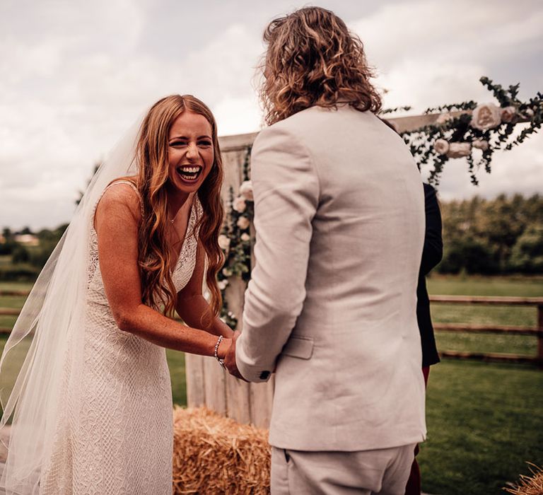 Outdoor wedding ceremony at barn venue in Cheshire