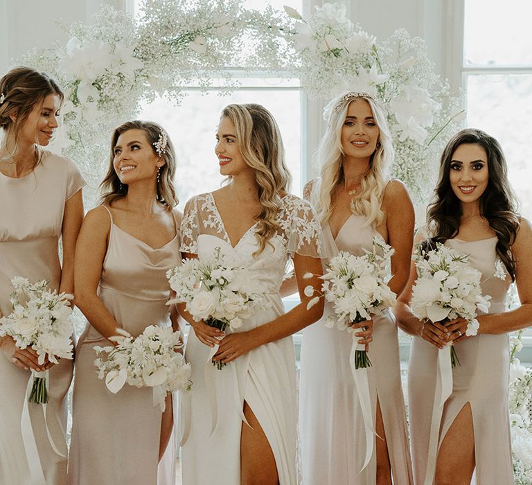 Bridal party portrait with bride and bridesmaids in Constellation Ame dresses 