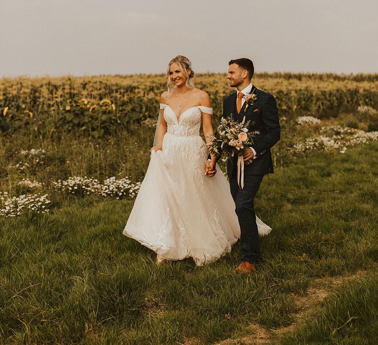 Bride and groom spend some time together at barn wedding in the Isle of Wight