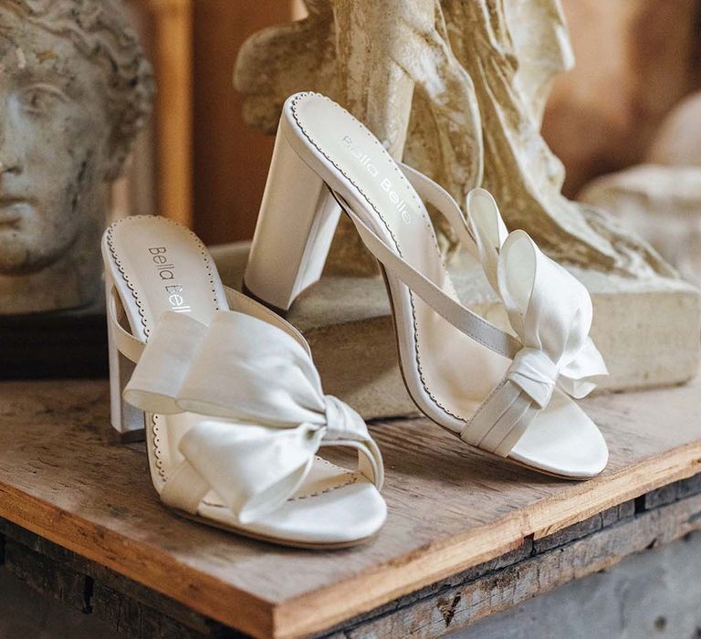 White wedding mules with block heel and half bow design 