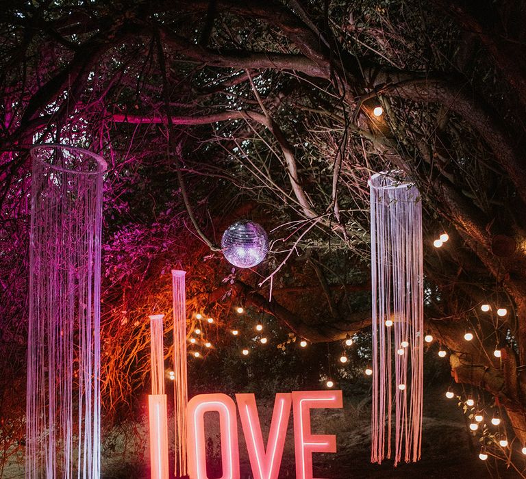 Large neon 'LOVE' sign for outdoor celebrations