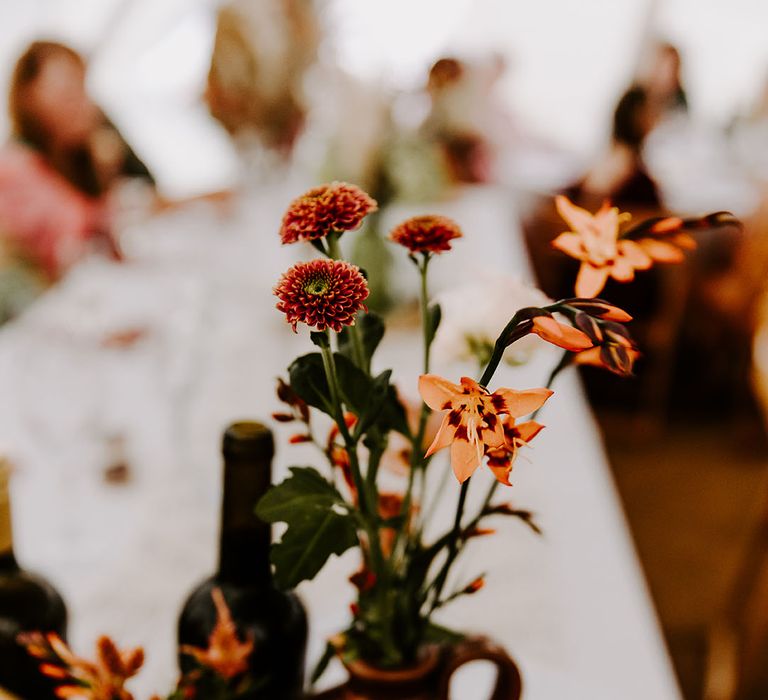 Colourful floral arrangements in small vase 