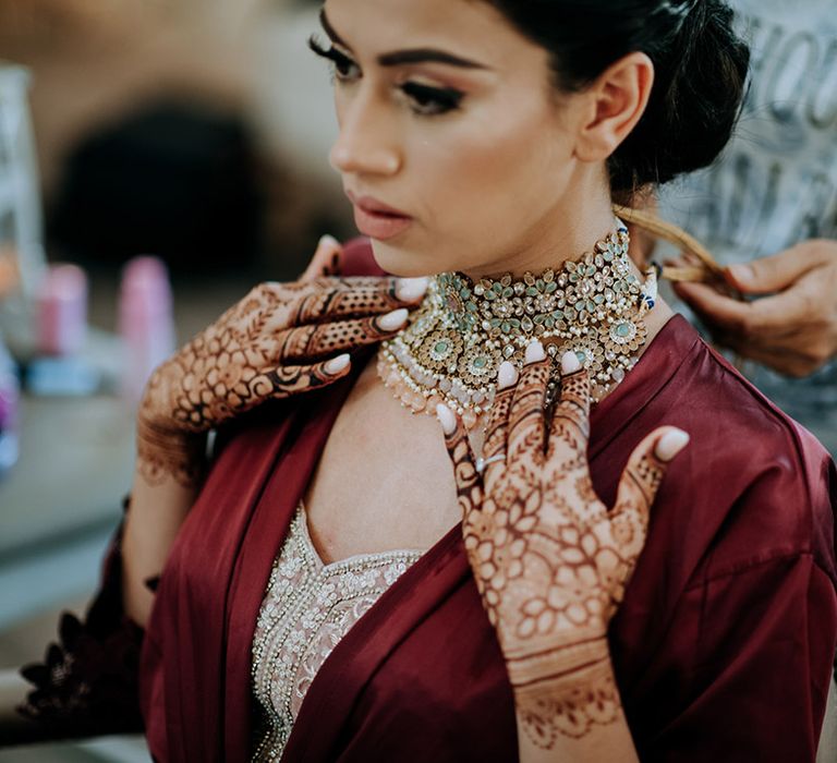 Panjabi Bride getting ready for wedding wearing beautiful Indian wedding jewellery