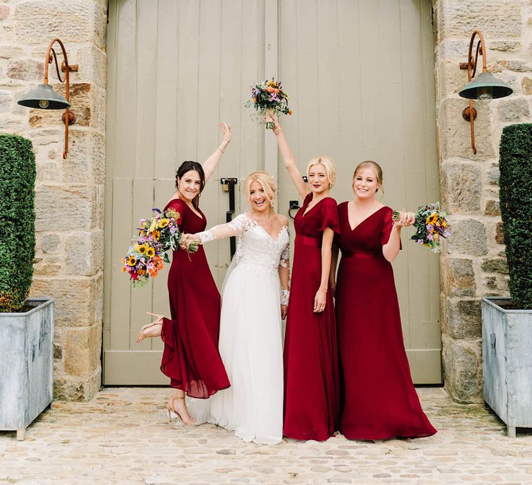 Bridesmaids in short sleeve red bridesmaids dresses in chiffon fabric