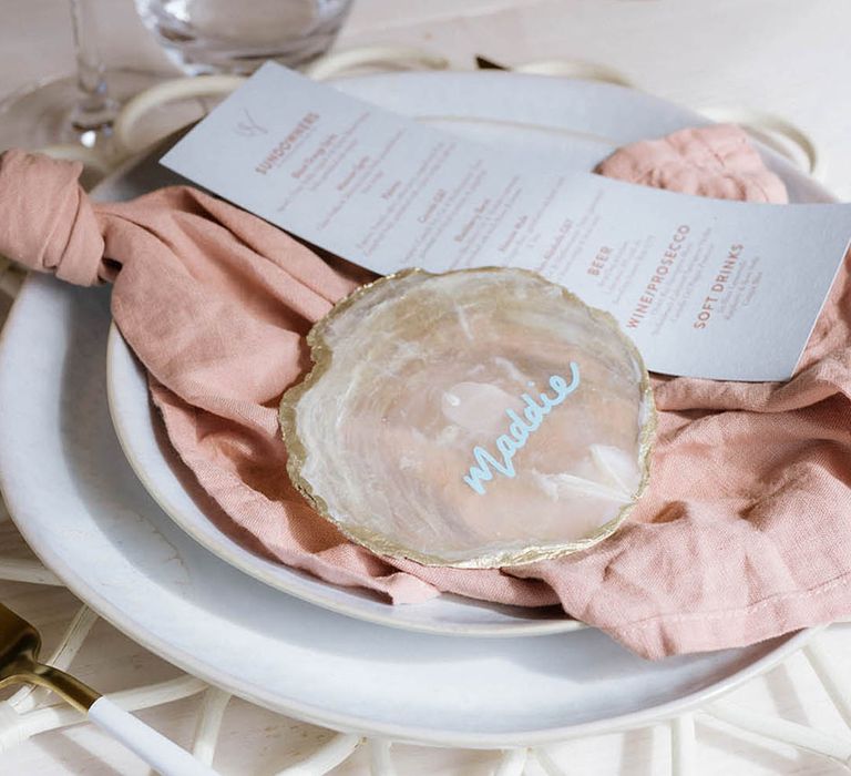 Agate crystal slice place names with pale blue coloured calligraphy of the guest's names for pastel tablescape 