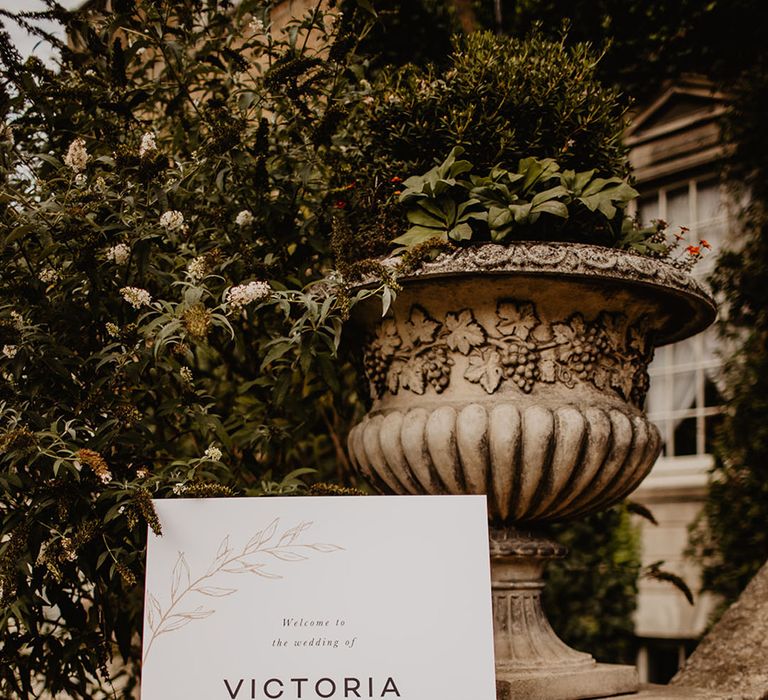 Black and white minimalist wedding welcome signage at classic style wedding 