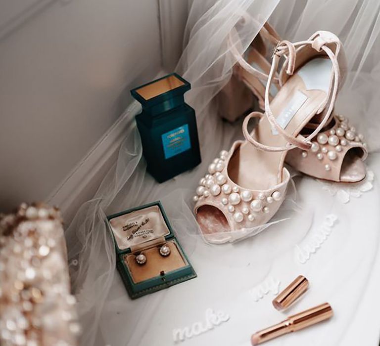 Pearl wedding accessories including shoes and earrings by Rebecca Kerr Photography