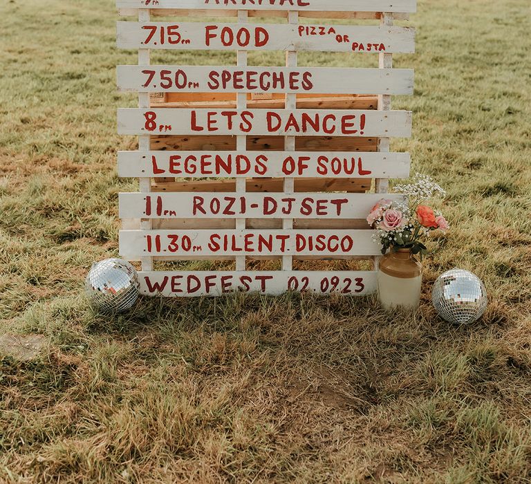 DIY wedding order of the day signage for festival wedding 