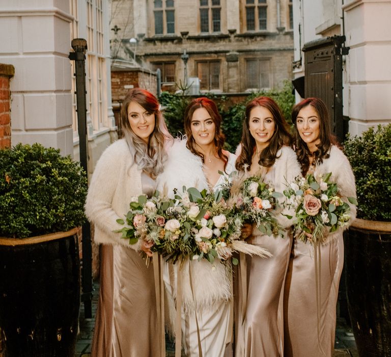 Bridal party wedding photography with pink bridesmaid dresses and pink rose and eucalyptus and pampas grass bouquet 