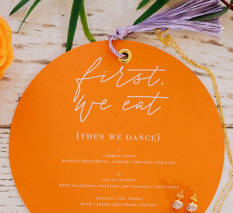 Orange circle wedding stationery menu car with lavender tassel 