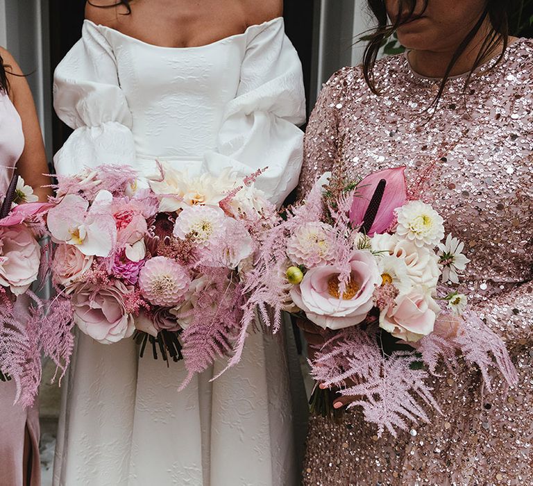 Pink and white wedding bouquets for pink and white themed wedding with bride in off the shoulder dress