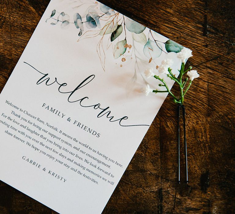 Welcome cards for guests with personal message from the brides for Chaucer Barn wedding with gypsophila hair pin 