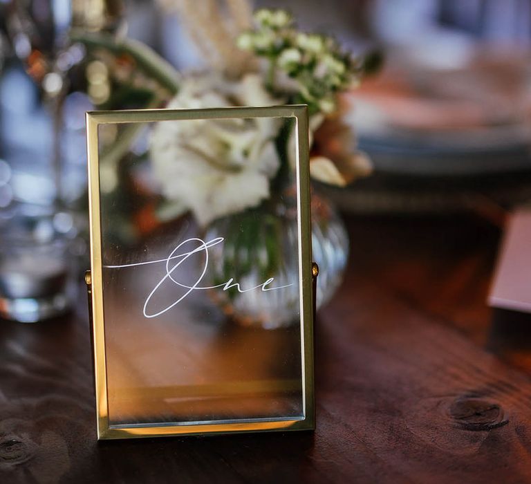 Gold frame wedding table sign 