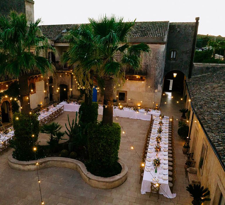 festoon lights at borgo del carato destination wedding 