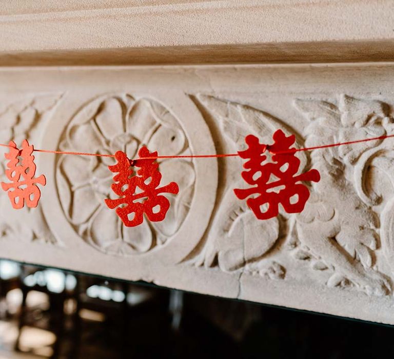 Red Chinese wedding decorations at Broadfield Court wedding venue