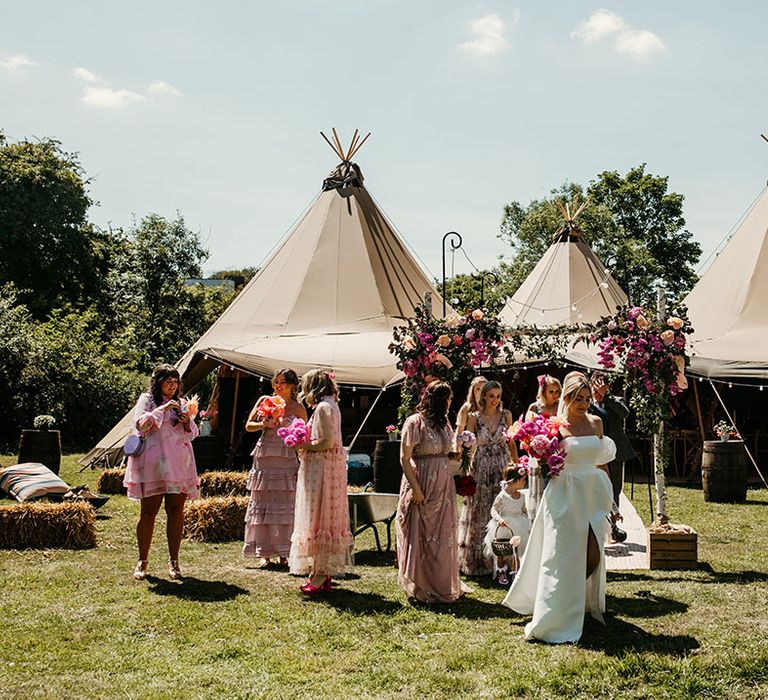 Tipi wedding venue in Northamptonshire decorated with pink wedding flowers 