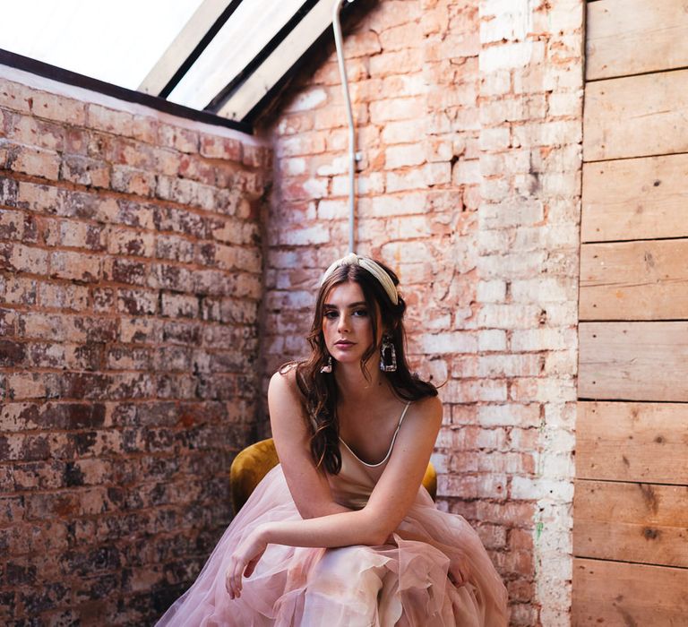 Bride in separates with pink skirt and satin camisole 