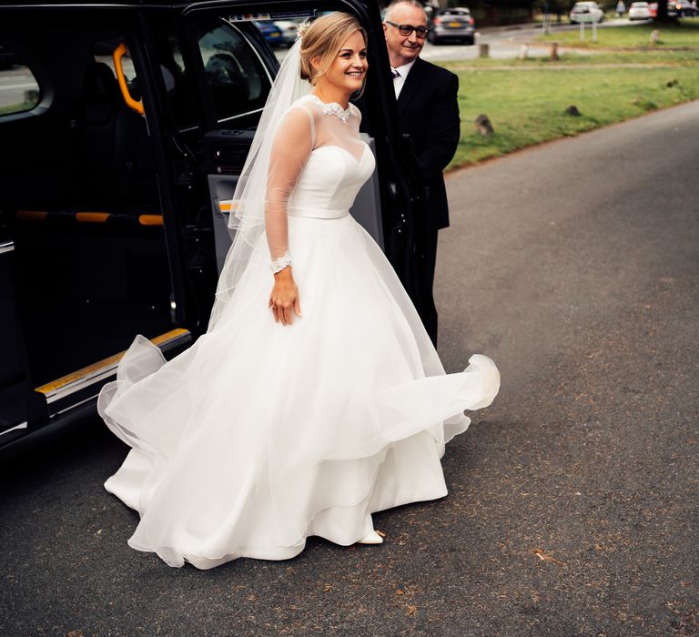 Bride leaves wedding car on the morning of her wedding