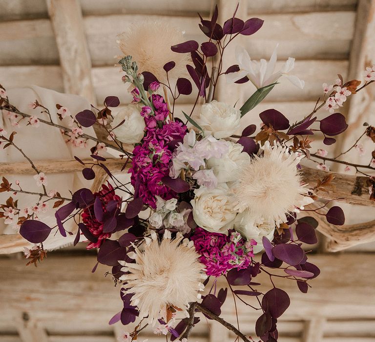 Purple and white floral arrangement 