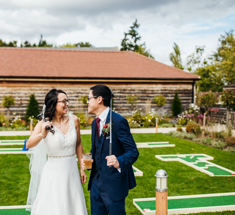 Bride & groom play crazy golf on their wedding day