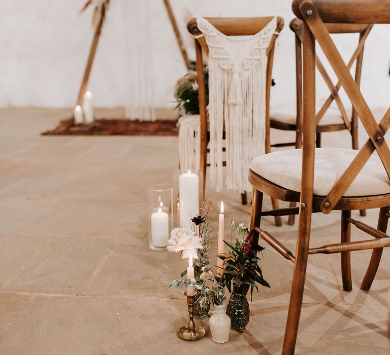 Aisle decor with romantic candles and flowers