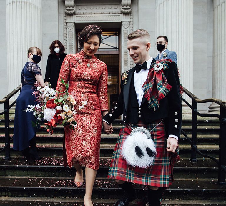 Bride and groom leave their intimate wedding