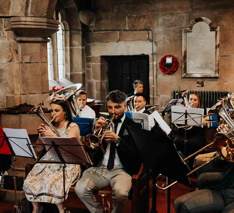 Brass band wedding entertainment at church ceremony