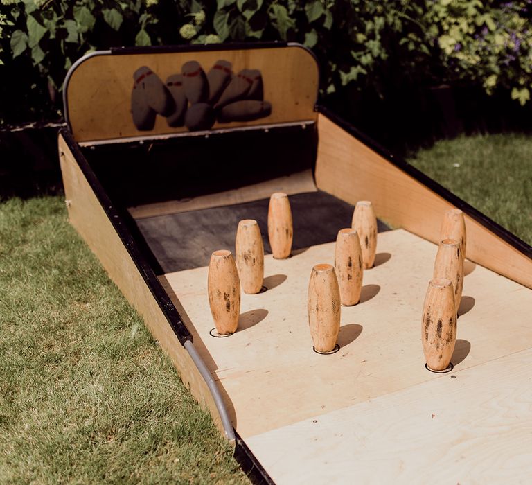 Outdoor garden game of bowling  | Joshua Gooding Photography