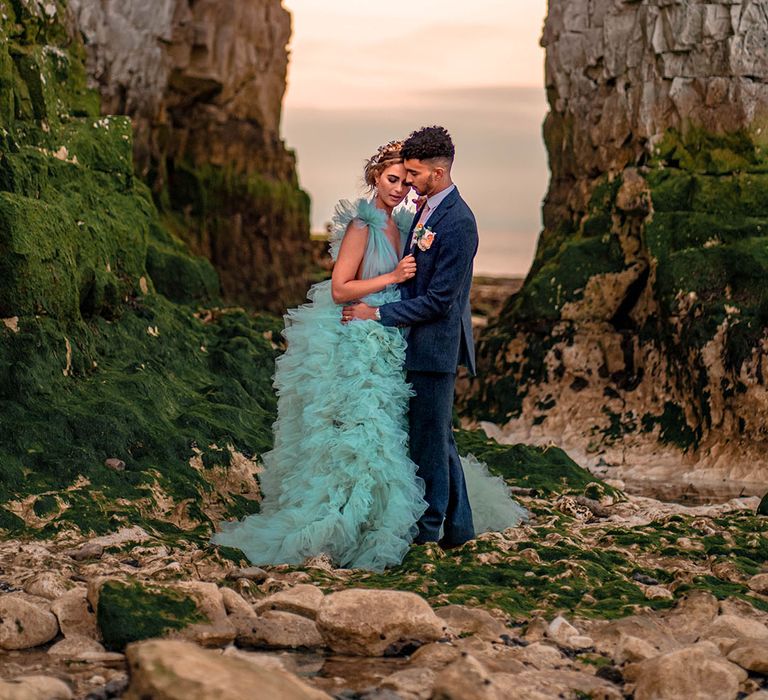 Botany Bay Kent wedding inspiration with bride in a mint green wedding dress