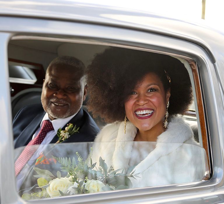 Bride arrives in vintage Bentley on her wedding day