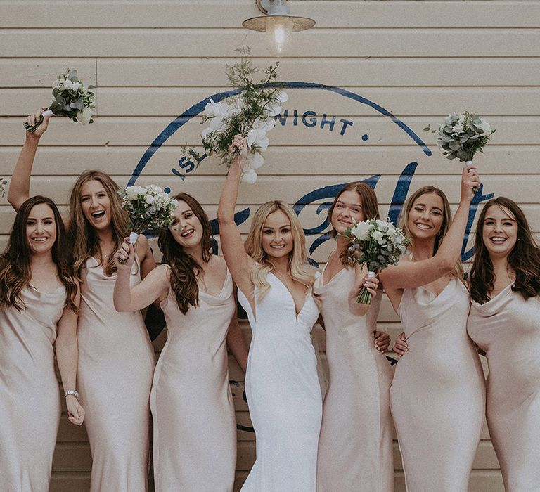 Bridesmaids in cowl neck dresses