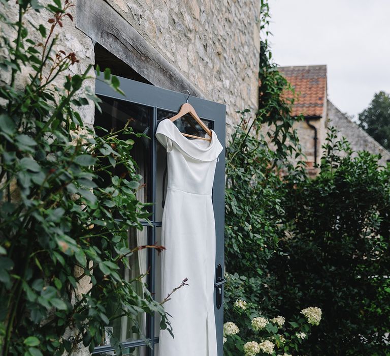 Bride's wedding dress on hanger at Middleton Lodge wedding venue 