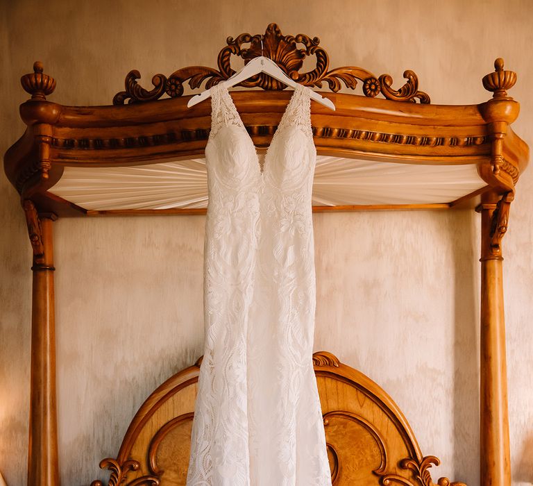 Sparkly sandal wedding shoes and white lace wedding dress with train 