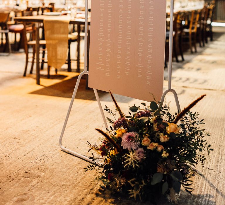 Pink, orange and red table plan sign 