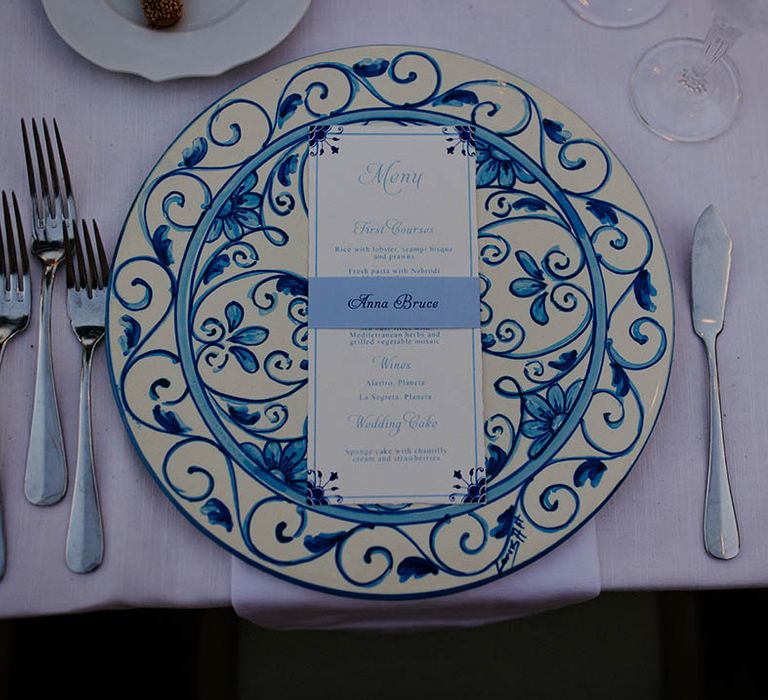 place setting with blue and white patterned tableware