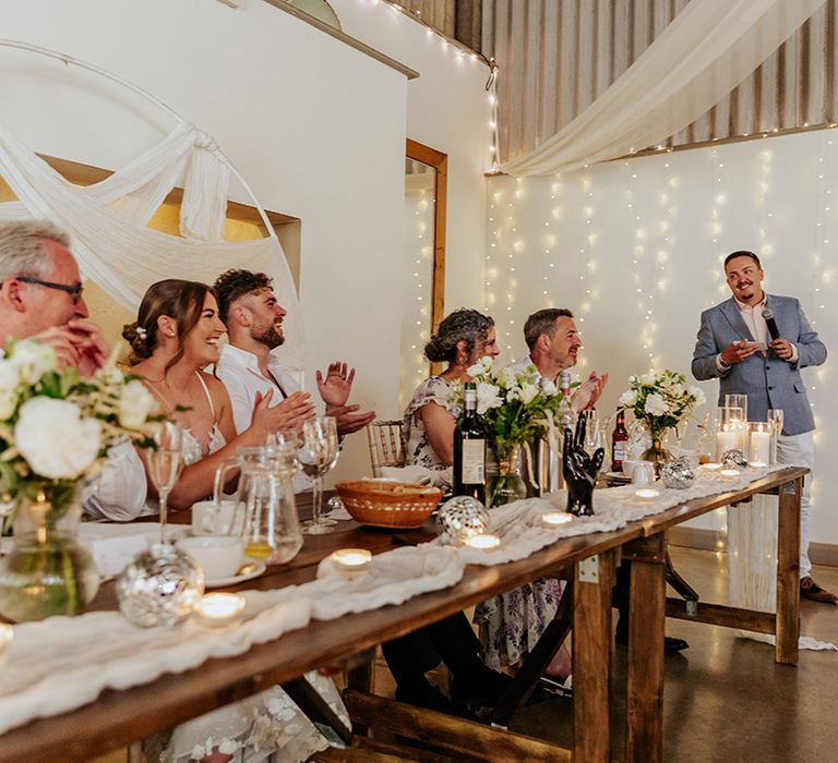 Wedding speeches are spoken out at the wedding breakfast at Houchins wedding venue 