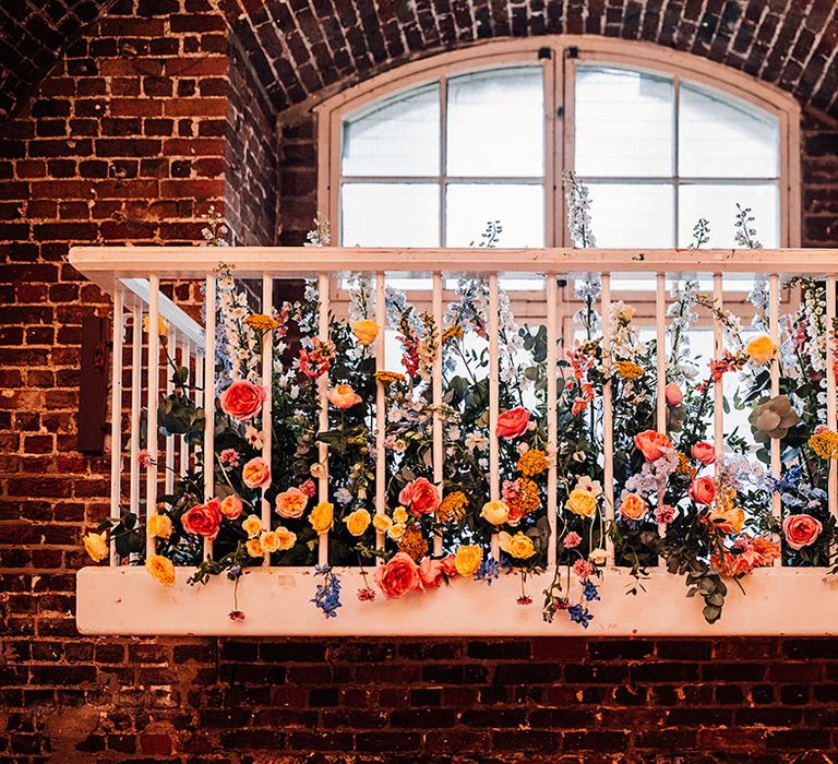 Colourful wedding flower decorations at The Crypt On The Green wedding venue 