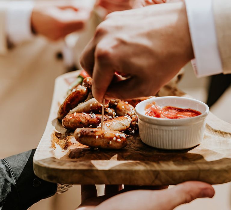 Mini cocktail sausage canapes for guests 