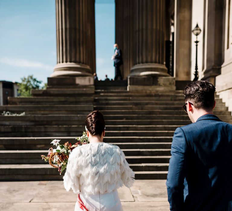 Bride in Faux fur coverup and trousers