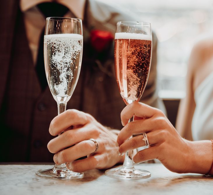 Champagne toast after intimate micro wedding ceremony 