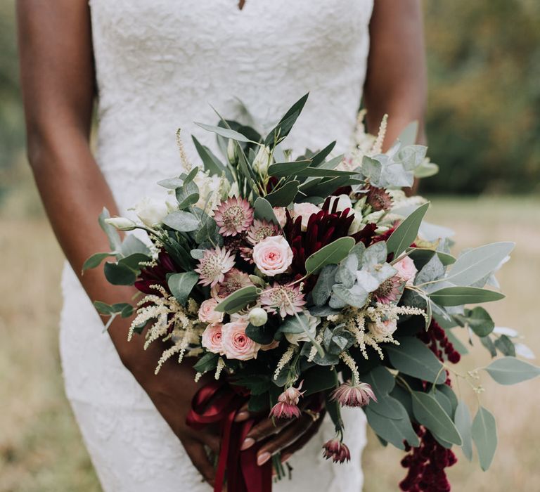 Burgundy wedding bouquet with eucalyptus and astilbe 