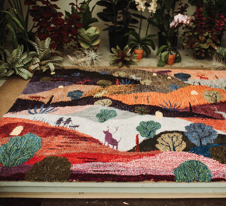 Colourful tuft rug handcrafted by the groom 