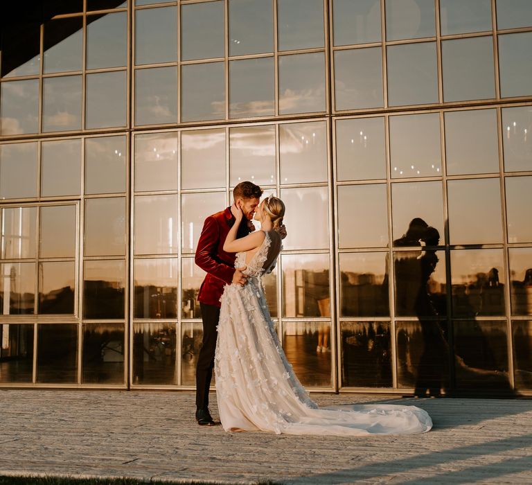 Bride and groom portrait outside Botley Hill Barn wedding venue in Surrey 