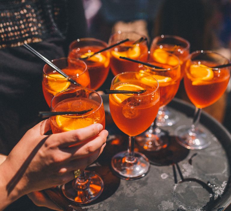 Colourful cocktails complete with fruit for wedding | Story + Colour