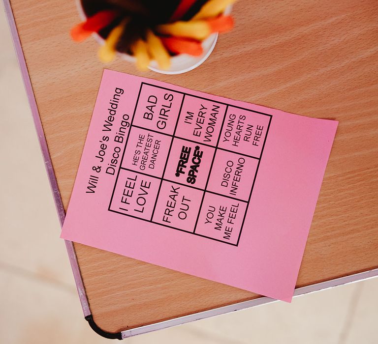 Pink wedding song disco bingo card for guests