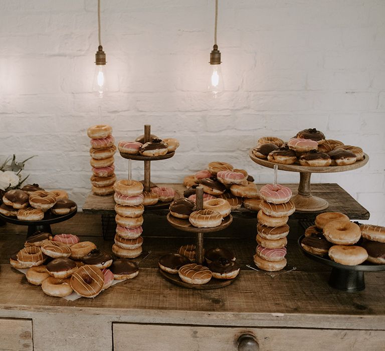 Dessert table with vegan doughnuts alternative to wedding cake 