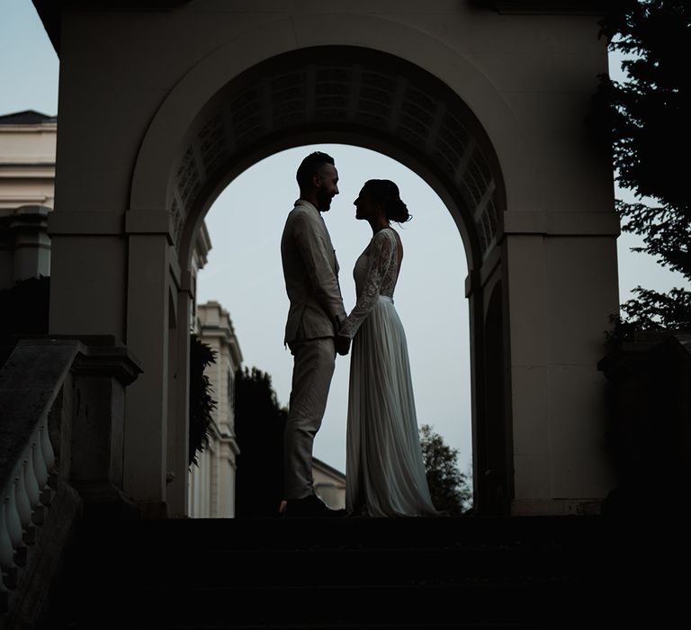 bride and groom silhouette photograph at Gunnersbury Park wedding 